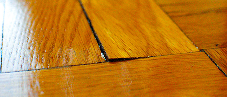 Common Causes of Buckled Hardwood Flooring